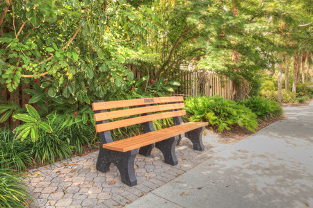 Bench to relax on near Naples Beach in summer in Naples, Floridaの写真素材