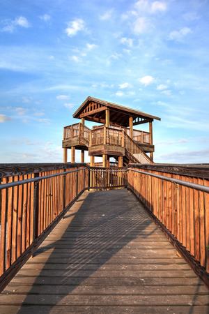Bird observation tower at the end of a boardwalk at sunrise on Tigertail Beach, Marco Island, Floridaの写真素材