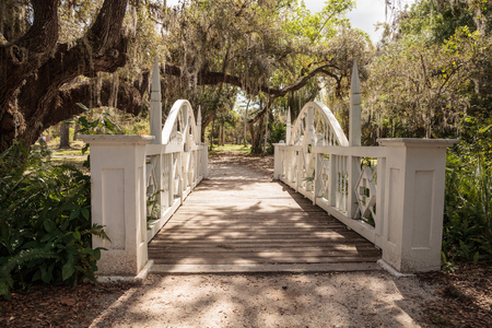 Estero, Florida, USA - February 23, 2019:  Old wooden bridge along the riverway at historic Koreshan State Park.のeditorial素材