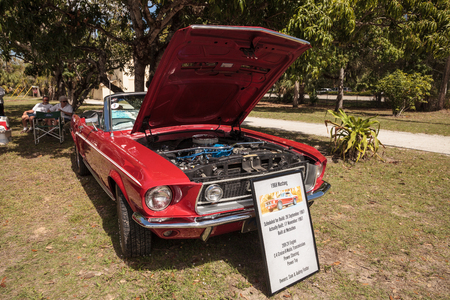 Estero, Florida, USA - February 23, 2019:  Red 1968 Ford Mustang at the 10th Annual Classic Car and Craft Show at historic Koreshan State Park. Editorial Use.のeditorial素材