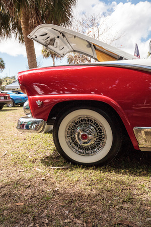 Estero, Florida, USA - February 23, 2019:  Red and White 1955 Ford Crown Victoria Skyliner at the 10th Annual Classic Car and Craft Show at historic Koreshan State Park. Editorial Use.のeditorial素材