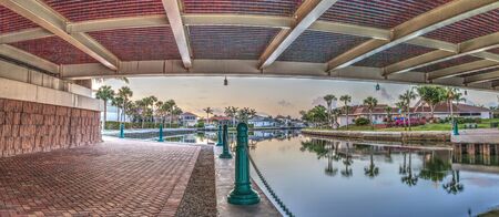 Under the Crossing the Herbert R. Savage Bridge on Collier boulevard Route 951 leading into Marco Island, Florida at sunrise.の写真素材
