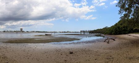 Dock and loan boat at Ken Thompson park in Sarasota, Floridaの写真素材