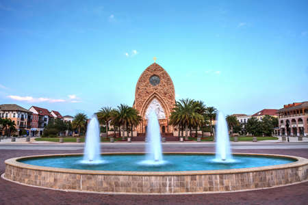 Ave Maria, Florida, USA â April 19, 2020: Water fountain in front of the Ave Maria Parish Church on the Ave Maria University campus at sunset in Ave Maria, Florida.のeditorial素材