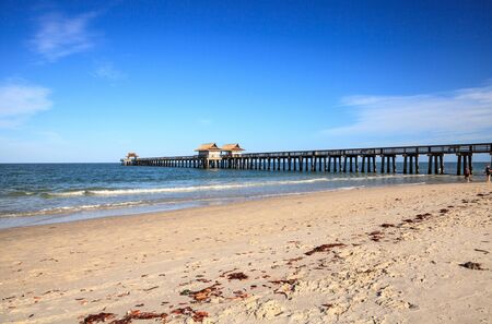 Naples, Florida, USA â May 9, 2020: Empty Naples Pier after it was closed off due to the Covid 19 virus outbreak in Naples, Floridaの写真素材