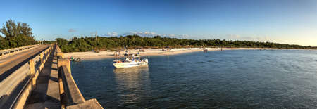 Big Carlos Pass bridge stretches across the water of Estero Bay in Bonita Springs, Floridaのeditorial素材