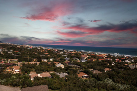 Sunset over Aerial view of the coastline of New Smyrna Beach and Ponce de Leon Inlet in Central...