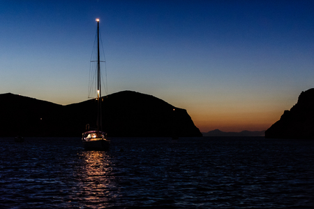 Night photo of sailing boat at anchor. Isle de Cabrera, Spainの写真素材