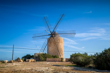Old stone windmill at Formentera island. Balearic islands, Spainの写真素材