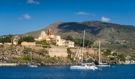 Lipari medieval town and sailing boats view from the water. Sicily, Italyのeditorial素材