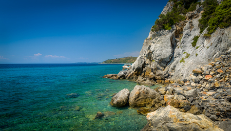 Greece Mediterranean coast with cliff and turquoise sea landscape.の写真素材