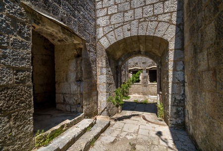 Fort Kabala main gate and entrance to old abandoned fortress. Historical heritage and touristic attraction, Montenegro.の写真素材