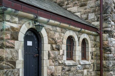 Stone wall of medieval stone church, Alesund, Norway.の写真素材