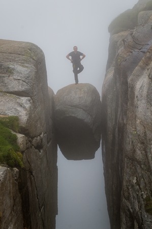 Tourist on Kjeragboltenの写真素材