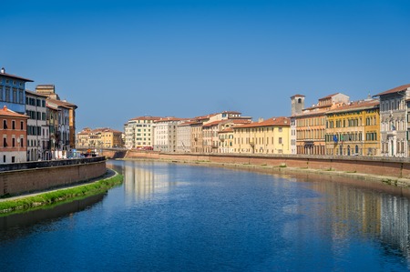 Old buildings of Pisa at Arno river shores. Toscana province, Italyの写真素材