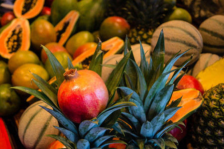 colorful exotic fruits on a marketの写真素材
