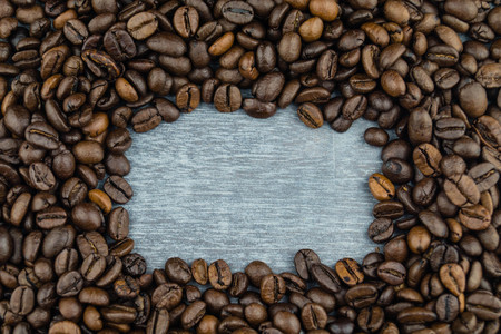 many brown roasted beans for a fresh cup of coffee