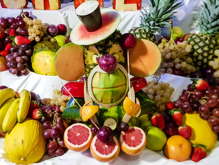 perfect food carving and fruits as decorationの写真素材