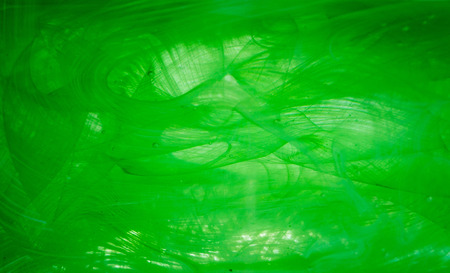 Abstract art with emulsion of oil paint in waterの写真素材