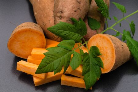 Yam the orange sweet potato Ipomoea batatasの写真素材