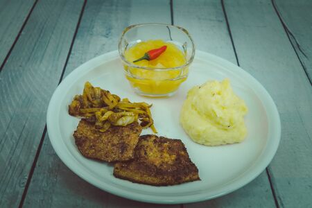 Fresh cattle liver with roasted onions and mashed potatoesの写真素材