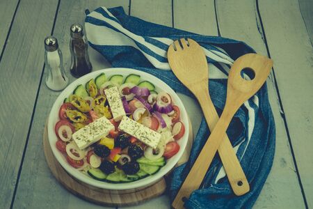 Greek salad with feta cheese olives and hot peppersの写真素材