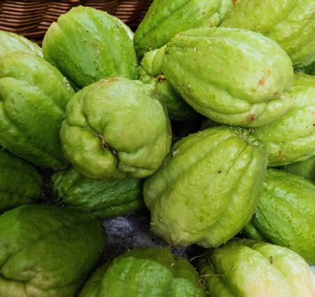 Chayote fruits on a farmers marketの写真素材