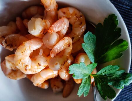 Boiled shrimp with parsley and chilli pepper