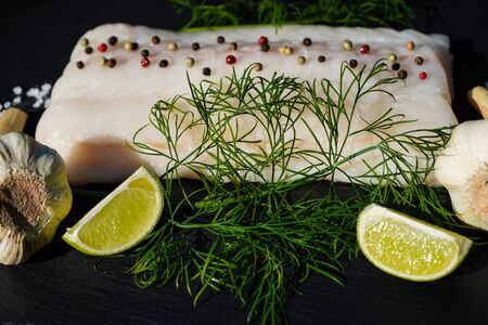 Fresh Atlantic Wolffish Steak with herbs and spices
