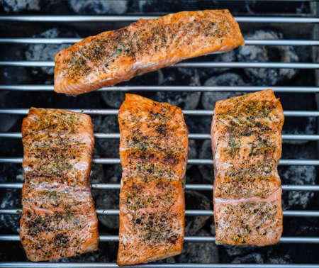 Fresh salmon trout fillet with herbs spices and salad for bbq