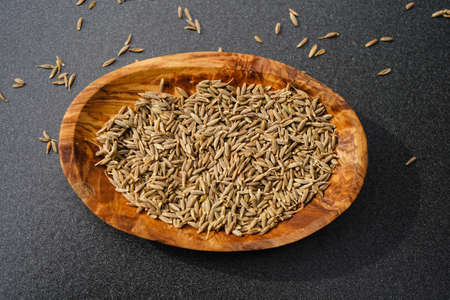 cumin Cuminum cyminum seeds and powderの写真素材