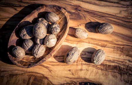 dried, dark brown, grated nutmeg seed kernel used as a spice