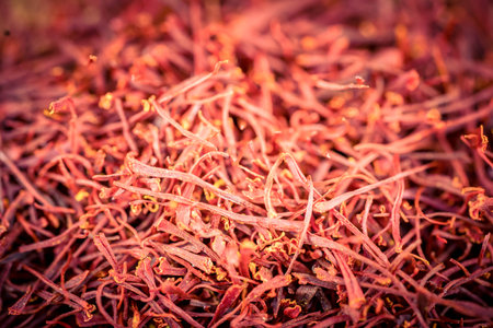 Saffron threads on olive wood