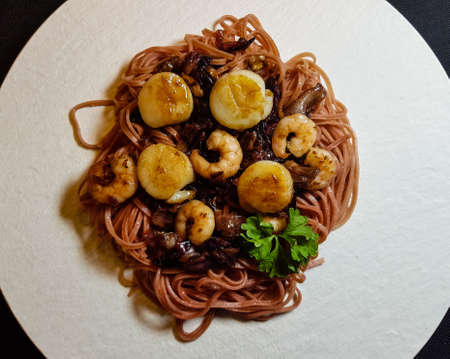 scallops with red linguine pasta herbs and spices