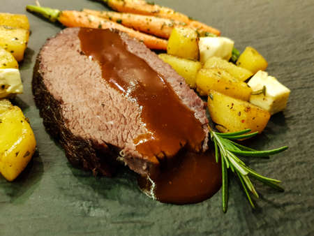 sunday roast beef shoulder with rosemary potatoes