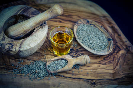 Cumin oil and olive wood