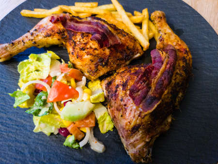 marinated chicken breast with baconの写真素材