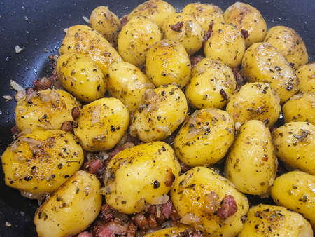 Farmers Breakfast with ham eggs and fried potatoesの写真素材