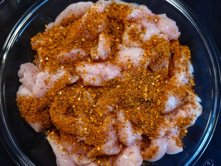 Roasted chicken breast fillet with herbs and spicesの写真素材