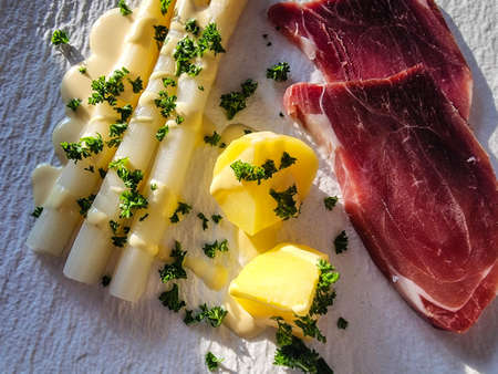 Asparagus seasonal vegetable with hamの写真素材