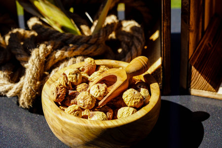 sweet dried figs in an olive wood bowl