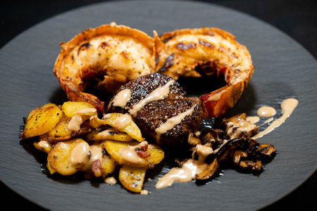 Surf and turf fillet steak and crawfish with wild forest mushroomsの写真素材