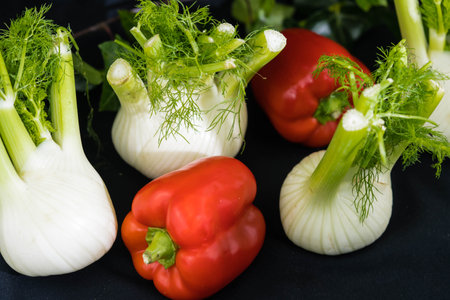 green and white fennel bulbs on olive woodの写真素材