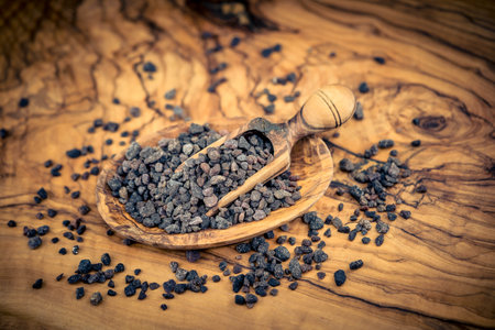 many salt crystals on olive woodの写真素材