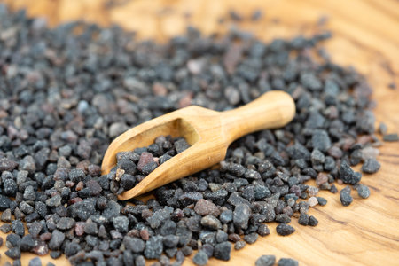 many salt crystals on olive woodの写真素材