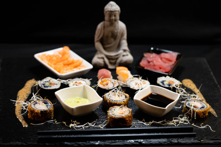 different kinds of asia seafood sushi on a slateの写真素材
