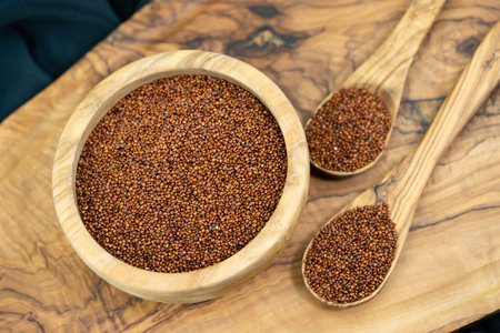 Chenopodium quinoa red or white seed on a wooden tableの写真素材