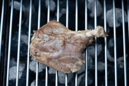 grilled pig wings - sliced open pork knuckle of a young pigの写真素材