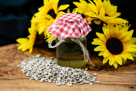 Sunflower Helianthus annuus Seeds on olive woodの写真素材