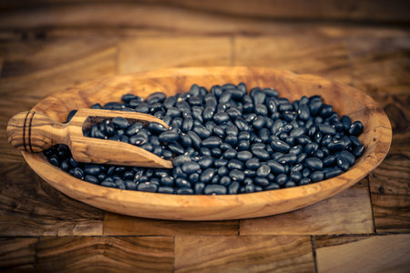 The black turtle bean is a small, shiny variety of the common bean Phaseolus vulgaris